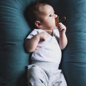 Snuggle me organic lounge cover in blue.